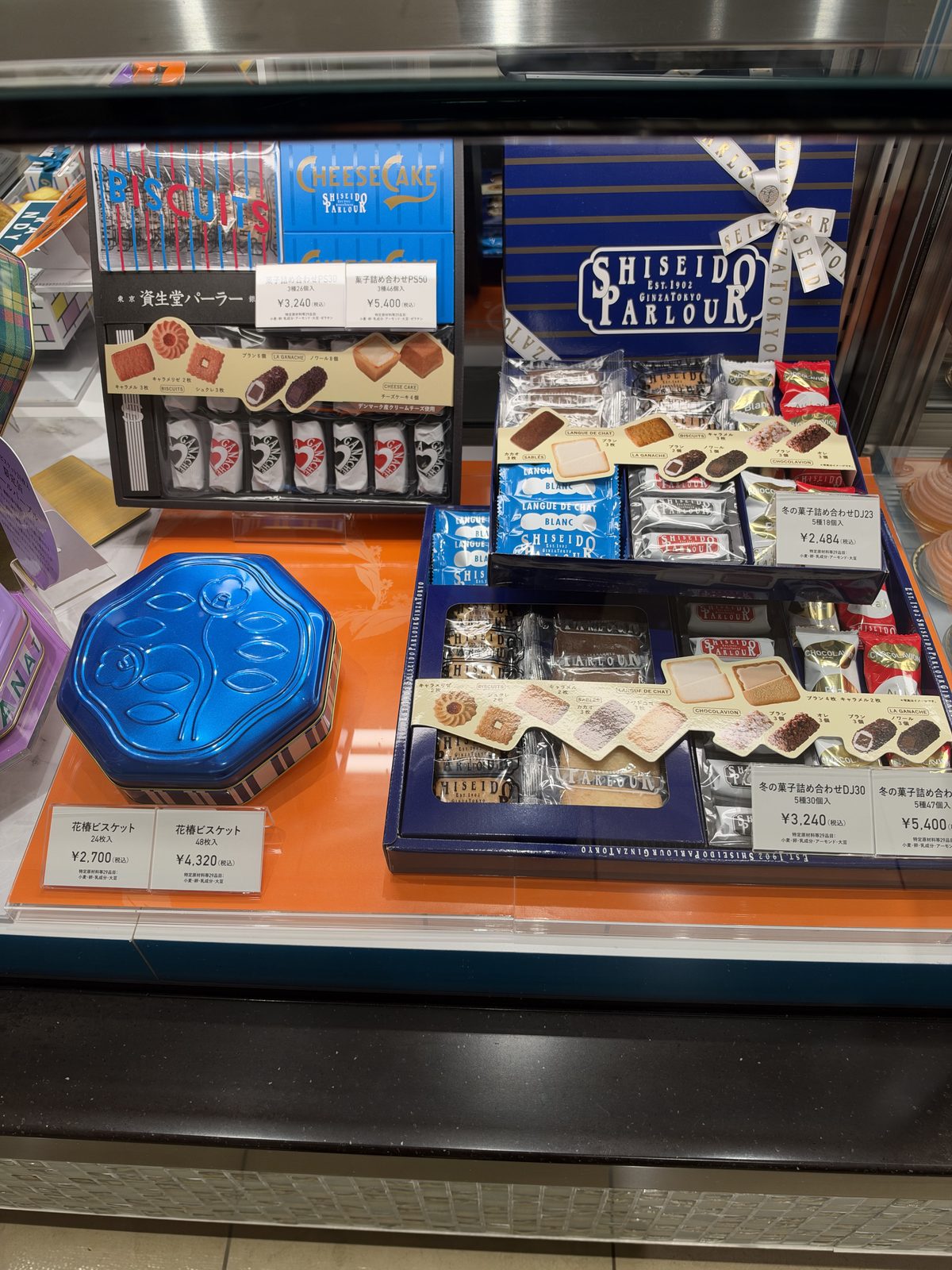 Boxed Western-style biscuits and sweets, priced on the tags, photographed in October 2026.